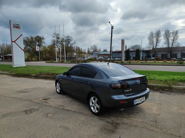 Серый Мазда 3, объемом двигателя 1.6 л и пробегом 250 тыс. км за 4000 $, фото 3 на Automoto.ua