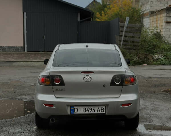 Серый Мазда 3, объемом двигателя 2 л и пробегом 229 тыс. км за 4000 $, фото 5 на Automoto.ua