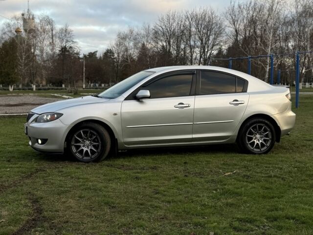 Серый Мазда 3, объемом двигателя 1.6 л и пробегом 300 тыс. км за 5400 $, фото 3 на Automoto.ua