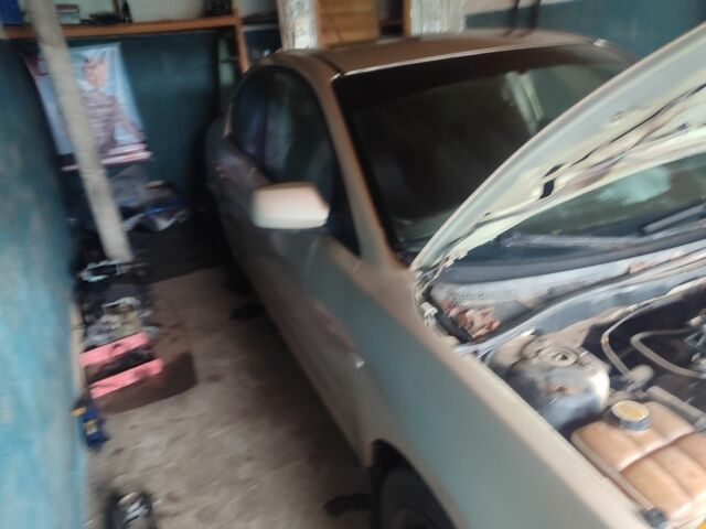 Сірий Мазда 3, об'ємом двигуна 1.6 л та пробігом 300 тис. км за 1900 $, фото 1 на Automoto.ua