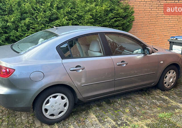 Сірий Мазда 3, об'ємом двигуна 1.6 л та пробігом 187 тис. км за 3950 $, фото 2 на Automoto.ua