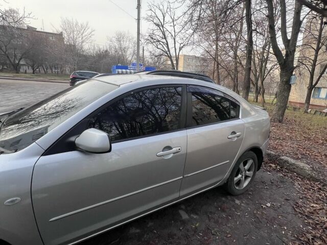 Серый Мазда 3, объемом двигателя 2 л и пробегом 268 тыс. км за 3650 $, фото 2 на Automoto.ua
