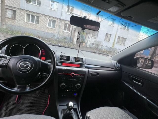 Серый Мазда 3, объемом двигателя 2 л и пробегом 268 тыс. км за 3650 $, фото 7 на Automoto.ua