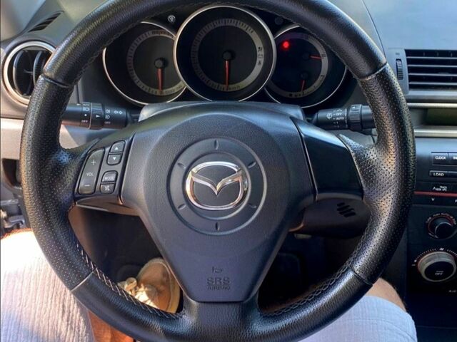 Серый Мазда 3, объемом двигателя 2 л и пробегом 232 тыс. км за 5300 $, фото 3 на Automoto.ua