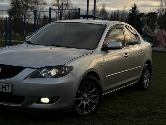 Серый Мазда 3, объемом двигателя 1.6 л и пробегом 300 тыс. км за 5400 $, фото 4 на Automoto.ua