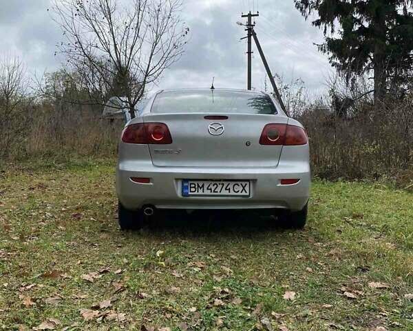 Серый Мазда 3, объемом двигателя 1.6 л и пробегом 320 тыс. км за 4000 $, фото 4 на Automoto.ua