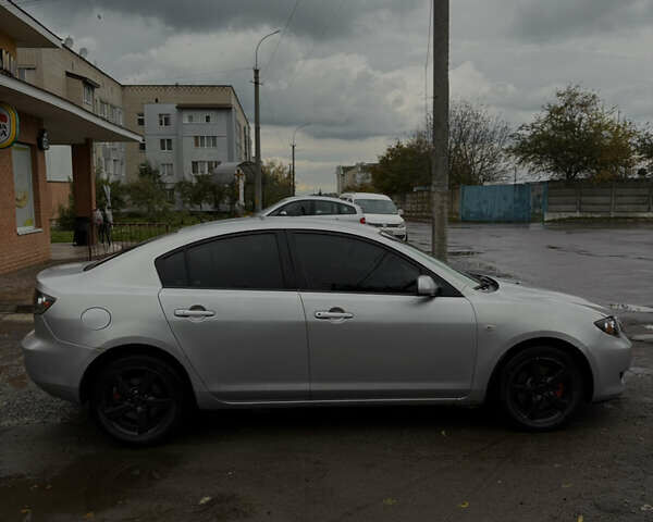 Серый Мазда 3, объемом двигателя 2 л и пробегом 229 тыс. км за 4000 $, фото 7 на Automoto.ua
