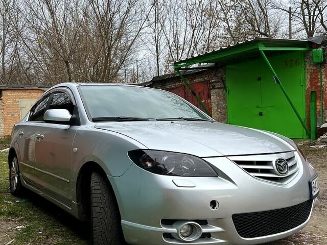 Сірий Мазда 3, об'ємом двигуна 2 л та пробігом 165 тис. км за 6100 $, фото 1 на Automoto.ua