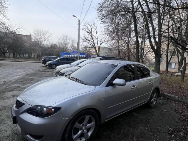 Серый Мазда 3, объемом двигателя 2 л и пробегом 268 тыс. км за 3650 $, фото 1 на Automoto.ua