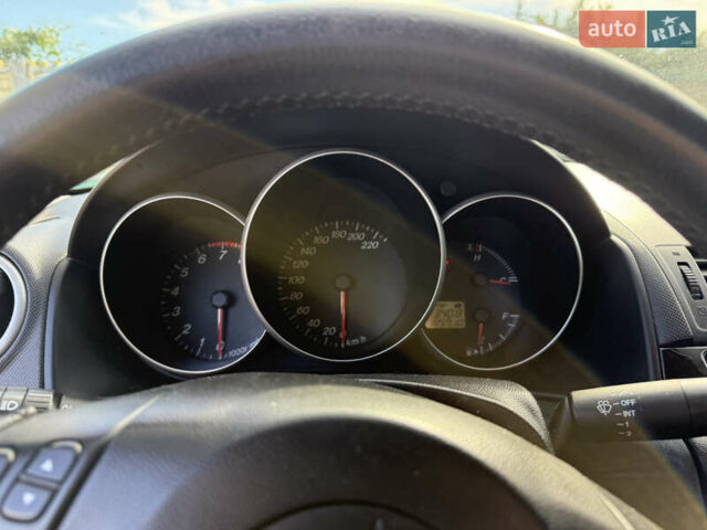 Серый Мазда 3, объемом двигателя 1.6 л и пробегом 185 тыс. км за 4200 $, фото 9 на Automoto.ua