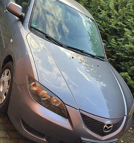 Сірий Мазда 3, об'ємом двигуна 1.6 л та пробігом 187 тис. км за 3950 $, фото 5 на Automoto.ua