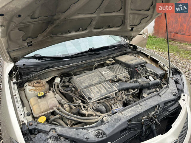 Сірий Мазда 3, об'ємом двигуна 1.6 л та пробігом 301 тис. км за 2750 $, фото 28 на Automoto.ua