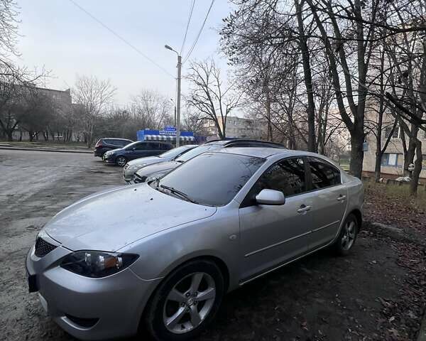 Серый Мазда 3, объемом двигателя 2 л и пробегом 268 тыс. км за 3650 $, фото 2 на Automoto.ua