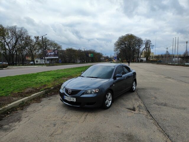 Серый Мазда 3, объемом двигателя 1.6 л и пробегом 250 тыс. км за 4000 $, фото 1 на Automoto.ua