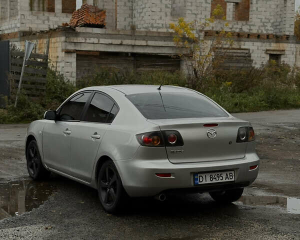 Серый Мазда 3, объемом двигателя 2 л и пробегом 229 тыс. км за 4000 $, фото 4 на Automoto.ua