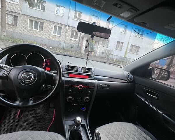 Серый Мазда 3, объемом двигателя 2 л и пробегом 268 тыс. км за 3650 $, фото 9 на Automoto.ua