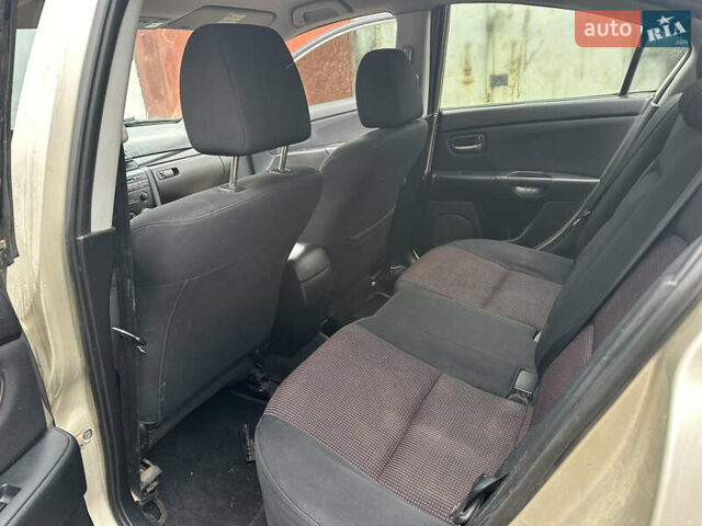 Сірий Мазда 3, об'ємом двигуна 1.6 л та пробігом 301 тис. км за 2750 $, фото 21 на Automoto.ua