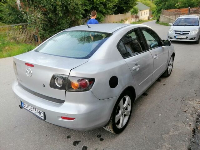 Сірий Мазда 3, об'ємом двигуна 2.2 л та пробігом 180 тис. км за 2194 $, фото 3 на Automoto.ua