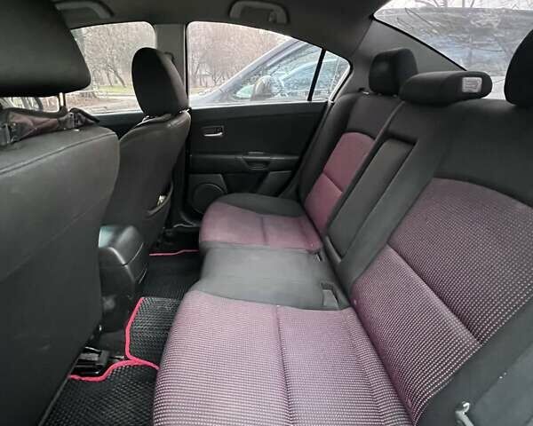 Серый Мазда 3, объемом двигателя 2 л и пробегом 268 тыс. км за 3650 $, фото 11 на Automoto.ua