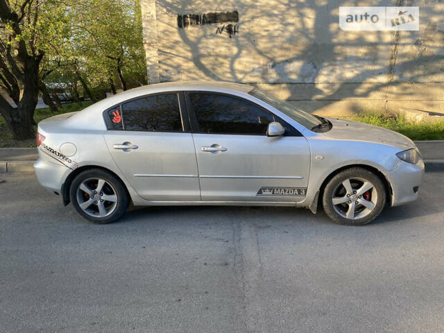 Сірий Мазда 3, об'ємом двигуна 1.6 л та пробігом 250 тис. км за 3699 $, фото 6 на Automoto.ua