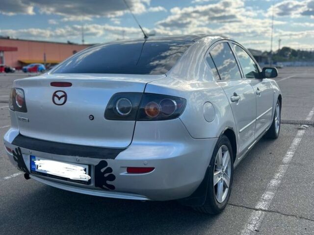 Сірий Мазда 3, об'ємом двигуна 1.6 л та пробігом 317 тис. км за 4000 $, фото 4 на Automoto.ua