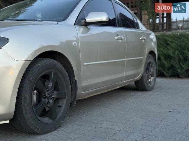 Серый Мазда 3, объемом двигателя 1.6 л и пробегом 238 тыс. км за 3600 $, фото 9 на Automoto.ua