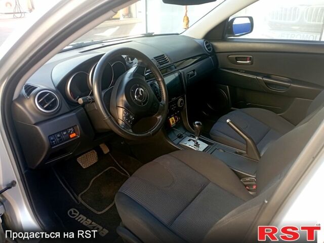 Серый Мазда 3, объемом двигателя 1.6 л и пробегом 226 тыс. км за 5500 $, фото 6 на Automoto.ua