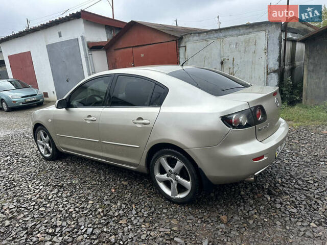 Сірий Мазда 3, об'ємом двигуна 1.6 л та пробігом 301 тис. км за 2750 $, фото 6 на Automoto.ua
