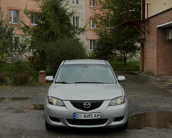Серый Мазда 3, объемом двигателя 2 л и пробегом 229 тыс. км за 4000 $, фото 1 на Automoto.ua