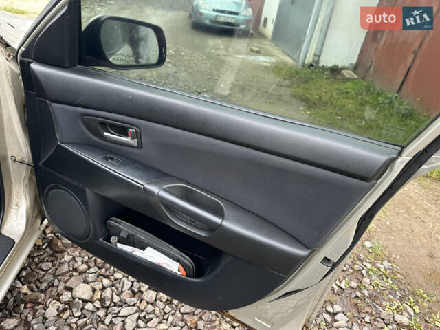 Сірий Мазда 3, об'ємом двигуна 1.6 л та пробігом 301 тис. км за 2750 $, фото 25 на Automoto.ua