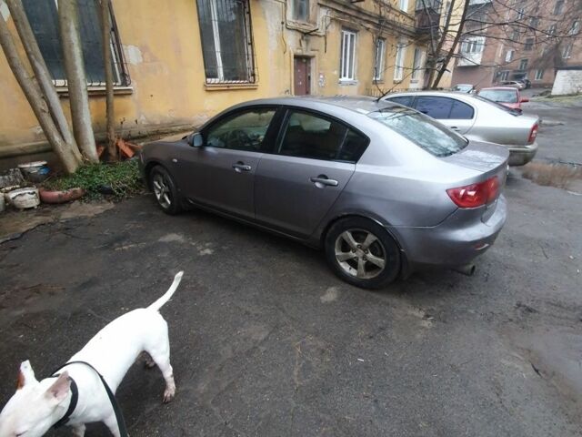 Серый Мазда 3, объемом двигателя 2 л и пробегом 280 тыс. км за 3000 $, фото 2 на Automoto.ua