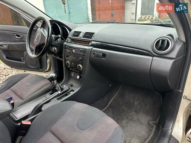 Сірий Мазда 3, об'ємом двигуна 1.6 л та пробігом 301 тис. км за 2750 $, фото 26 на Automoto.ua