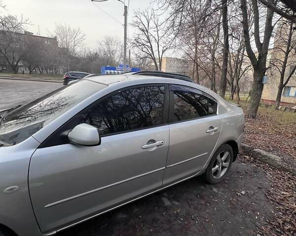 Серый Мазда 3, объемом двигателя 2 л и пробегом 268 тыс. км за 3650 $, фото 3 на Automoto.ua