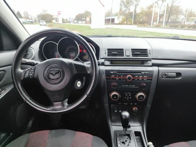 Серый Мазда 3, объемом двигателя 1.6 л и пробегом 250 тыс. км за 4000 $, фото 4 на Automoto.ua