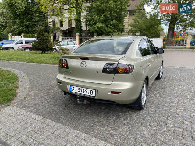 Серый Мазда 3, объемом двигателя 1.6 л и пробегом 260 тыс. км за 5100 $, фото 3 на Automoto.ua