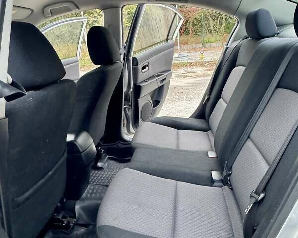 Серый Мазда 3, объемом двигателя 2 л и пробегом 214 тыс. км за 4450 $, фото 19 на Automoto.ua
