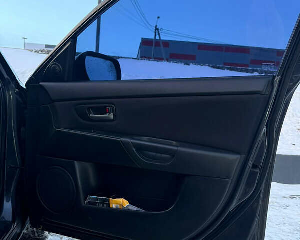 Серый Мазда 3, объемом двигателя 1.6 л и пробегом 279 тыс. км за 5000 $, фото 8 на Automoto.ua