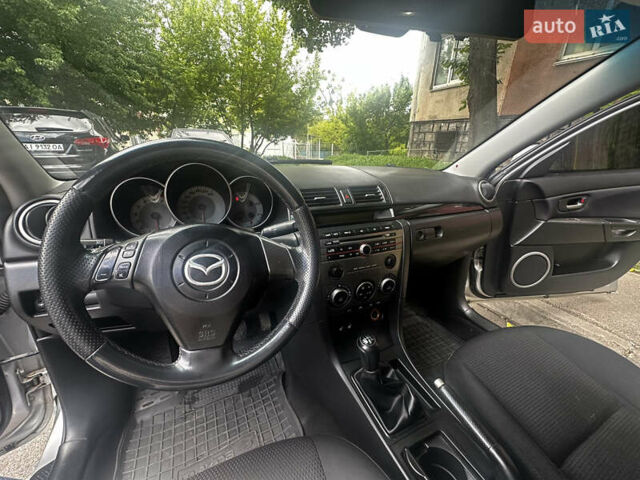 Сірий Мазда 3, об'ємом двигуна 1.6 л та пробігом 244 тис. км за 3990 $, фото 5 на Automoto.ua