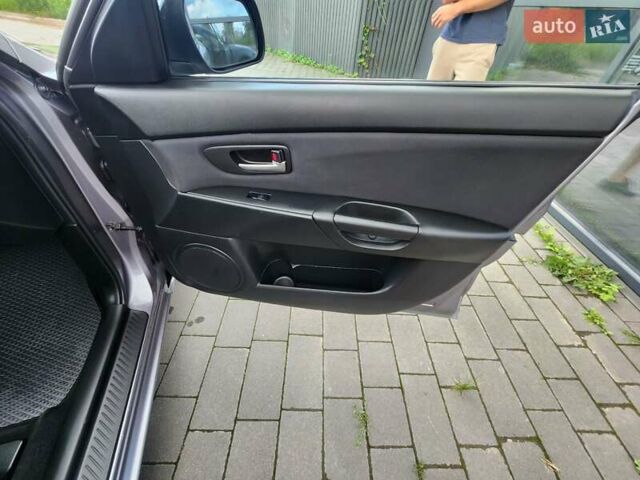 Серый Мазда 3, объемом двигателя 1.6 л и пробегом 175 тыс. км за 4950 $, фото 28 на Automoto.ua