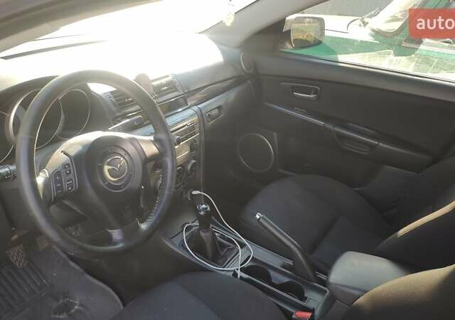 Серый Мазда 3, объемом двигателя 1.6 л и пробегом 241 тыс. км за 3300 $, фото 10 на Automoto.ua
