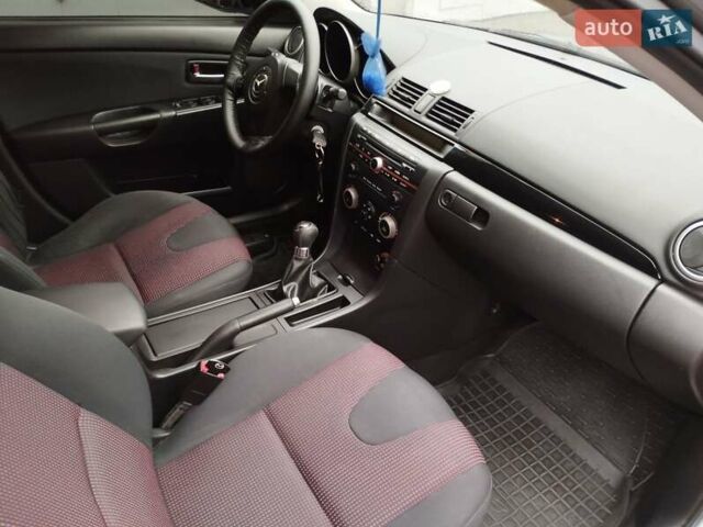 Сірий Мазда 3, об'ємом двигуна 1.6 л та пробігом 238 тис. км за 5150 $, фото 10 на Automoto.ua