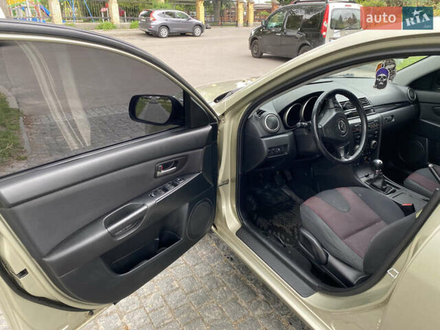 Серый Мазда 3, объемом двигателя 1.6 л и пробегом 260 тыс. км за 5100 $, фото 5 на Automoto.ua