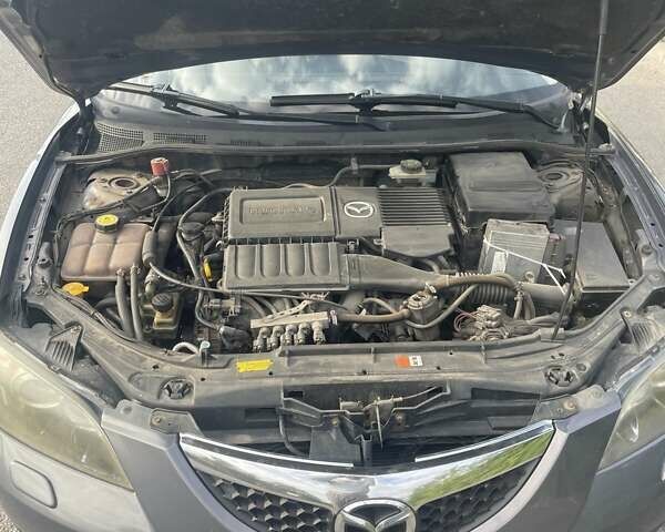 Серый Мазда 3, объемом двигателя 1.6 л и пробегом 325 тыс. км за 3800 $, фото 9 на Automoto.ua