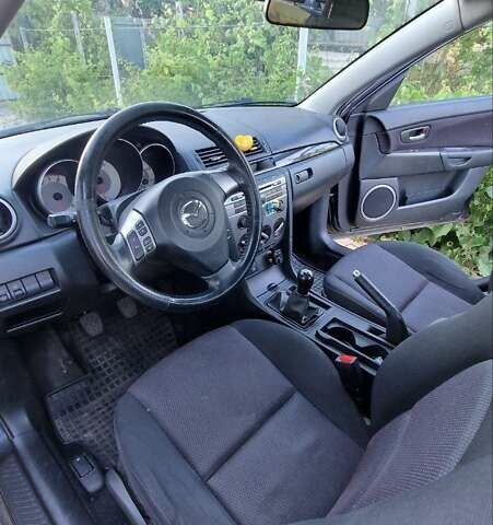 Серый Мазда 3, объемом двигателя 1.6 л и пробегом 269 тыс. км за 4800 $, фото 4 на Automoto.ua