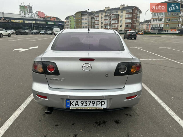 Серый Мазда 3, объемом двигателя 1.6 л и пробегом 127 тыс. км за 4900 $, фото 5 на Automoto.ua