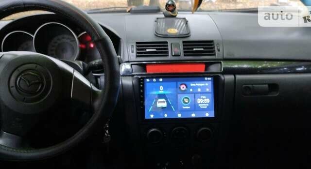 Сірий Мазда 3, об'ємом двигуна 1.6 л та пробігом 273 тис. км за 4500 $, фото 4 на Automoto.ua