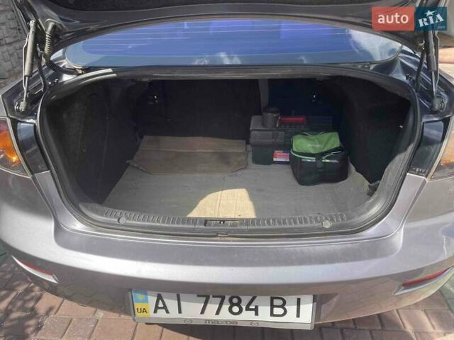 Серый Мазда 3, объемом двигателя 2 л и пробегом 139 тыс. км за 4500 $, фото 1 на Automoto.ua