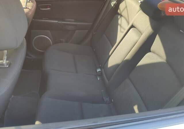 Серый Мазда 3, объемом двигателя 1.6 л и пробегом 241 тыс. км за 3300 $, фото 12 на Automoto.ua