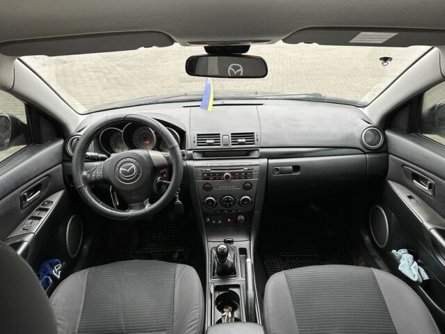 Серый Мазда 3, объемом двигателя 1.6 л и пробегом 310 тыс. км за 4400 $, фото 9 на Automoto.ua