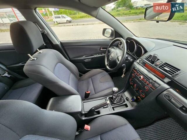 Серый Мазда 3, объемом двигателя 1.6 л и пробегом 175 тыс. км за 4950 $, фото 29 на Automoto.ua